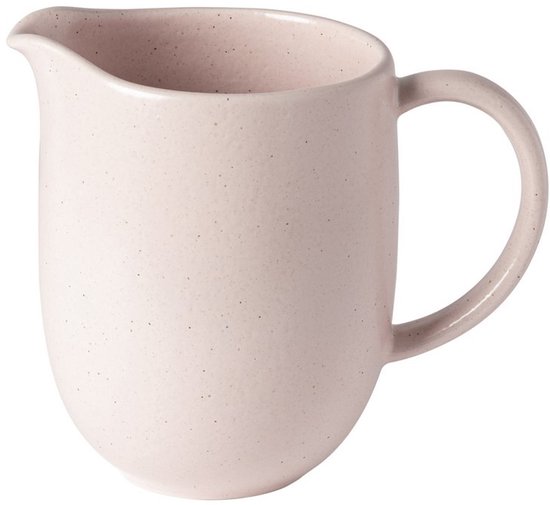Roze schenkkan met handvat, een textuur met kleine spikkels.