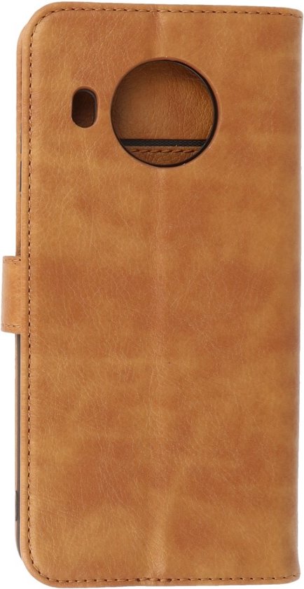 Bruin telefoonhoesje in boekstijl, gesloten met een telefoon erin.