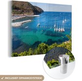MuchoWow® Glasschilderij 60x40 cm - Schilderij acrylglas - Een uitzicht op zee vanaf het Capraia eiland bij Elba - Foto op glas - Schilderijen