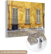 MuchoWow® Glasschilderij 80x60 cm - Schilderij acrylglas - Milaan - Geel - Huis - Foto op glas - Schilderijen