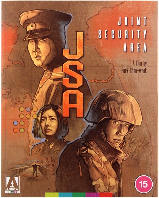 Hoes van de film 'Joint Security Area', met drie personages op een achtergrond van een landkaart. De titel staat verticaal in oranje letters.