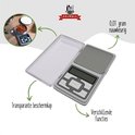 Krumble weegschaal met grijze details en transparante kap. Tekst: Transparante beschermkap, 0,01 gram nauwkeurig, verschillende functies.