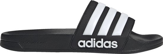 Bade slipper adidas noire avec trois bandes blanches et logo adidas sur la bride.