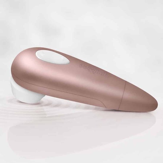 Roze Satisfyer Air Pulse met witte applicator en bedieningsknop.