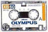 Olympus microcassette met opnamesnelheid van 2.4 - 1.2 cm/sec