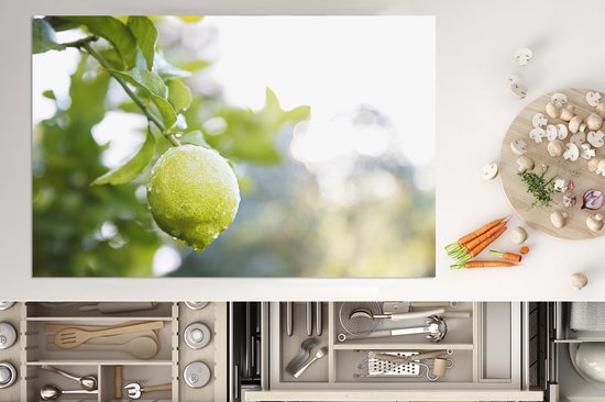 KitchenYeah® Inductie beschermer 80x52 cm - Close up of wet lime on branch - Kookplaataccessoires - Afdekplaat voor kookplaat - Inductiebeschermer - Inductiemat - Inductieplaat mat