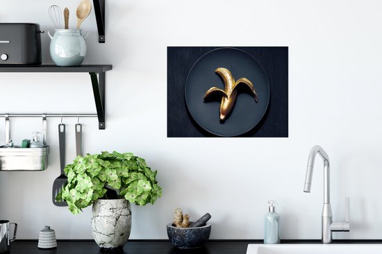 Poster Gouden banaan op een donkere achtergrond - 40x30 cm