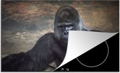 KitchenYeah® Inductie beschermer 81x52 cm - Portret afbeelding van een zwarte Gorilla - Kookplaataccessoires - Afdekplaat voor kookplaat - Inductiebeschermer - Inductiemat - Inductieplaat mat