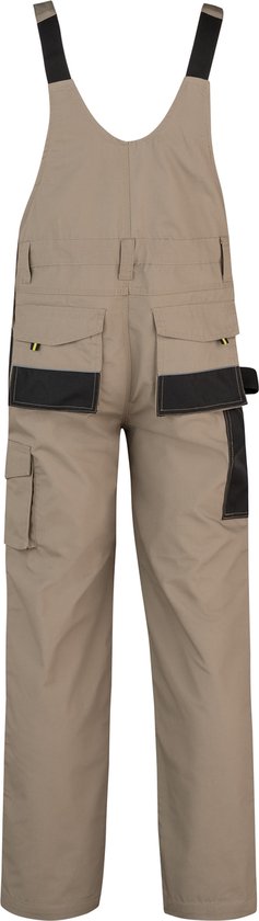 Arrière d'une salopette de travail beige avec des détails noirs et plusieurs poches.