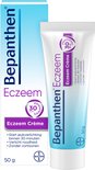 Bepanthen Eczeem crème tube en kartonnen verpakking, beide met paars "30 min" logo.