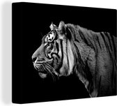 Canvas Schilderij Zijaanzicht van een tijger op een zwarte achtergrond - zwart wit - 80x60 cm - Wanddecoratie