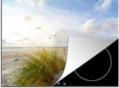 KitchenYeah® Inductie beschermer 60x52 cm - Strand - Zee - Vogels - Kookplaataccessoires - Afdekplaat voor kookplaat - Inductiebeschermer - Inductiemat - Inductieplaat mat