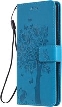 Mobigear Telefoonhoesje geschikt voor Xiaomi Mi 9T Hoesje | Mobigear Tree Bookcase Portemonnee | Pasjeshouder voor 2 Pasjes | Telefoonhoesje voor Pinpas / OV Kaart / Rijbewijs - Blauw