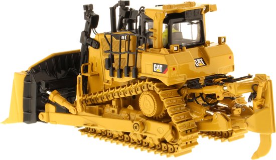 Gele CAT D9T bulldozer met schuifblad en ripper, getoond op witte achtergrond.
