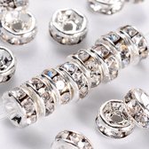 Rhinestone spacer beads, zilver met heldere chatons, 8x3mm. Verkocht per 100 stuks !