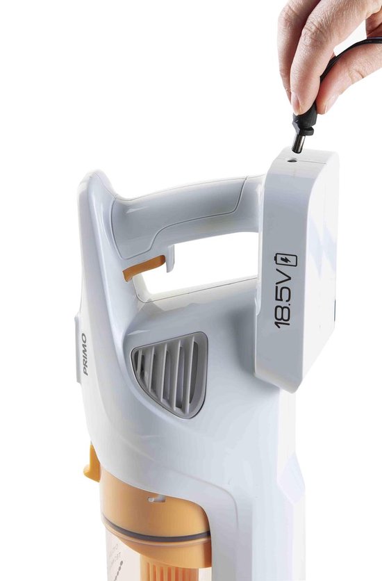 Witte en oranje steelstofzuiger, hand wordt gebruikt om de oplader aan te sluiten op de 18.5V batterij.