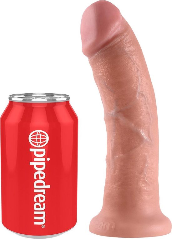 Un gode ceinture beige, en forme de poire, à côté d'une canette rouge avec le logo Pipedream.