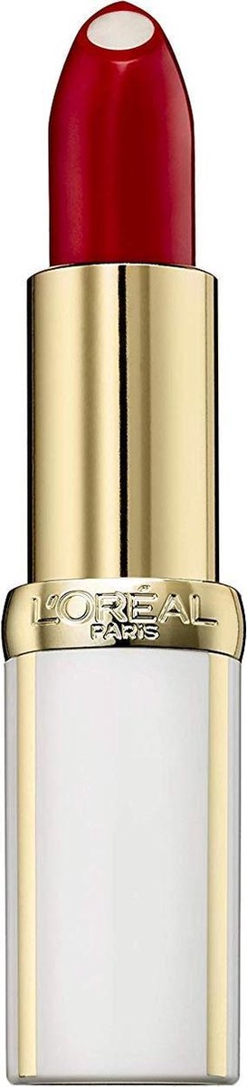 Een rode L'Oréal lipstick met gouden en witte huls, liggend met de dop ernaast.