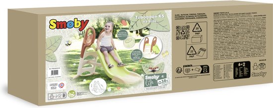 Smoby KS glijbaan in groen en bruin, met een meisje erop, gemaakt in Frankrijk.
