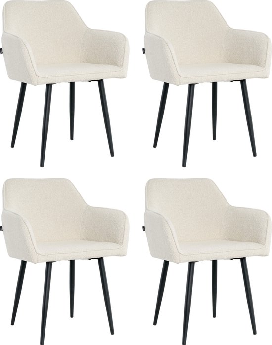 Set van vier crèmekleurige eetkamerstoelen met boucle stof en zwarte poten.