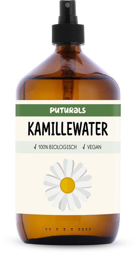 Bruine glazen fles met groen en wit label. Puturals Kamillewater, 100% biologisch, vegan. Met afbeelding van een witte margrietbloem.