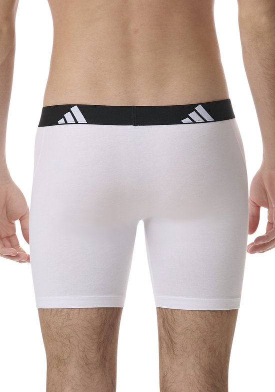 Achterkant witte Adidas boxer met zwarte tailleband met logo.
