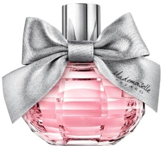 Flacon de parfum en verre avec liquide rose et un nœud argenté.