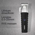Zwarte en zilveren BaByliss tondeuse met aan/uit knop en 10 opzetkammen. Tekst: Lithium draadloos, Lengtes 0.5-25mm, RVS messen.