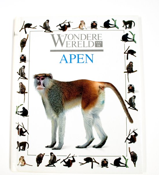 Boek 'De Wondere Wereld van de Apen' met op de voorkant een grote aap met een witte snuit, grijze borst en bruine rug, omringd door kleinere afbeeldingen van apen aan takken.
