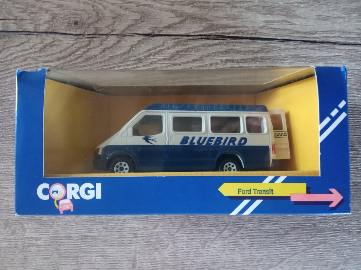 Ford Transit Corgi Toys C676/1 , 1 : 36 Ford Transit Bluebird 1986 , Let Op deze Ford Transit komt uit 1986 dus de originele verpakking is hier en daar wat sleets zie foto's