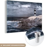 MuchoWow® Glasschilderij 120x80 cm - Schilderij acrylglas - Vuurtoren Ribadeo tijdens een stormachtige dag - Foto op glas - Schilderijen