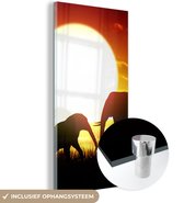 MuchoWow® Glasschilderij 20x40 cm - Schilderij acrylglas - Een illustratie van olifanten bij een zonsondergang - Foto op glas - Schilderijen