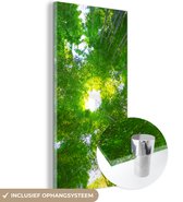 MuchoWow® Glasschilderij 80x160 cm - Schilderij acrylglas - Boomtoppen in het Bamboebos van Arashiyama - Foto op glas - Schilderijen