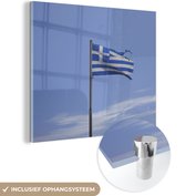 MuchoWow® Glasschilderij 90x90 cm - Schilderij acrylglas - Gescheurde Griekse vlag die wappert - Foto op glas - Schilderijen