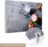 MuchoWow® Glasschilderij 90x60 cm - Schilderij acrylglas - Smoothie - Fruit - Aardbei - Bes - Marmer - Foto op glas - Schilderijen