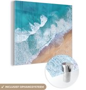 MuchoWow® Glasschilderij 20x20 cm - Schilderij acrylglas - Strand - Water - Zee - Foto op glas - Schilderijen