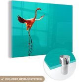 MuchoWow® Glasschilderij 60x40 cm - Schilderij acrylglas - Een flamingo bij helder blauw water - Foto op glas - Schilderijen
