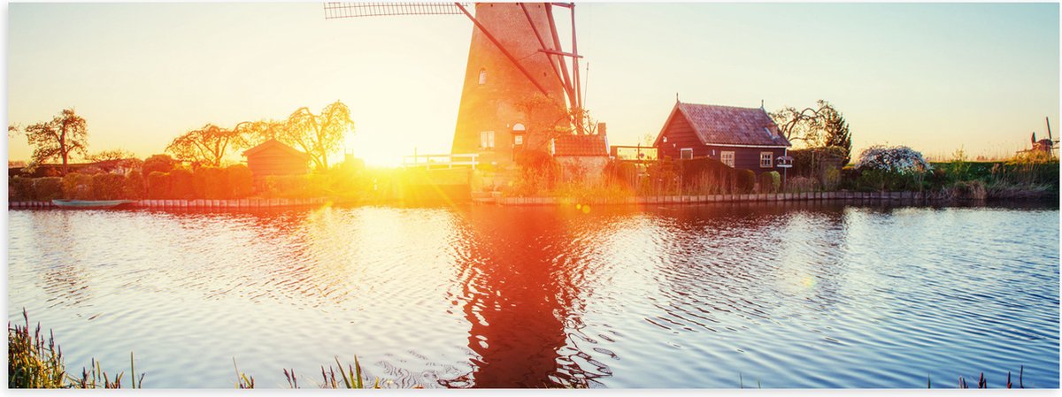WallClassics - Poster (Mat) - Zonlicht langs Hollandse Molen aan het Water - 60x20 cm Foto op Posterpapier met een Matte look