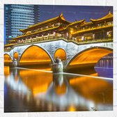 Muursticker - Verlichte Anshun Brug in de Avond in Chengdu, China - 50x50 cm Foto op Muursticker