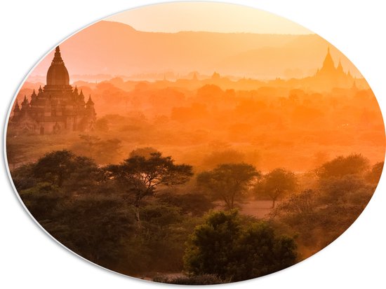 PVC Schuimplaat Ovaal - Fel Zonlicht over de Tempels van Myanmar - 56x42 cm Foto op Ovaal (Met Ophangsysteem)