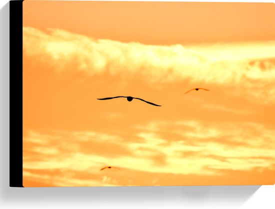 Canvas - Silhouet van Vogels Vliegend in Oranje Lucht - 40x30 cm Foto op Canvas Schilderij (Wanddecoratie op Canvas)