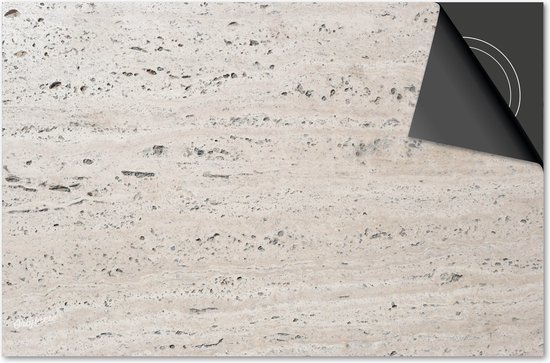 Protection d'induction beige clair aspect pierre naturelle, avec des détails de rainures et de trous.