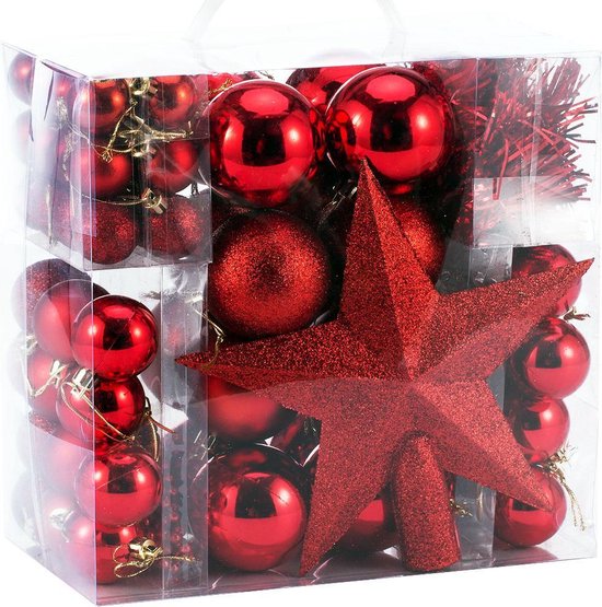 Een transparante doos gevuld met rode kerstballen, een grote rode glitterster en glitterdraad.