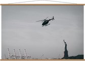Schoolplaat – Helikopter boven Vrijheidsbeeld - 150x100cm Foto op Textielposter (Wanddecoratie op Schoolplaat)