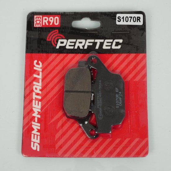 Plaquettes de frein semi-métalliques Perftec, S1070R, emballées sur fond rouge.
