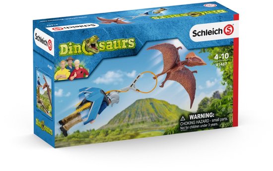 Schleich Dinosaurs speelgoeddoos met een Pterodactylus die wegvliegt van een jongen met jetpack en vangring.