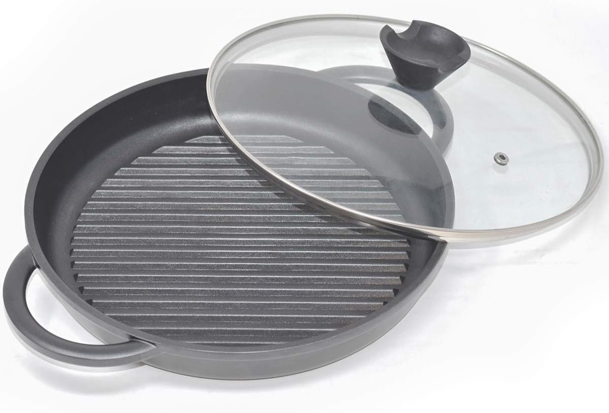 Joeji's Kitchen round grill pan made of cast aluminum with silicone handles and ovenproof lid, contains a bonded steel base suitable for Induction 27 cm non-stick coating