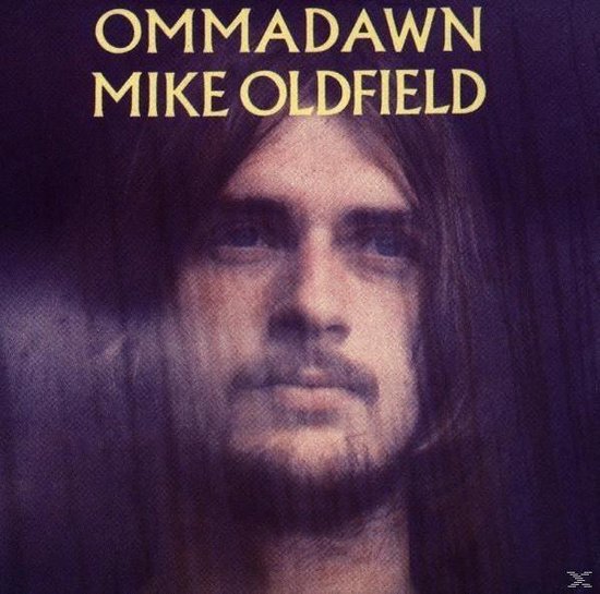 Albumhoes met een portret van Mike Oldfield. De tekst 'OMMADAWN MIKE OLDFIELD' staat bovenaan.