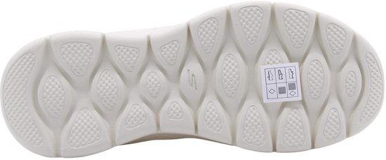 Onderkant van een witte Skechers damesschoen met een profiel van gestructureerde cirkels en ruiten, inclusief maattabel.