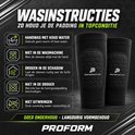 Zwarte Performance Pro scheenbeschermers met honingraatpadding en antislip rand.